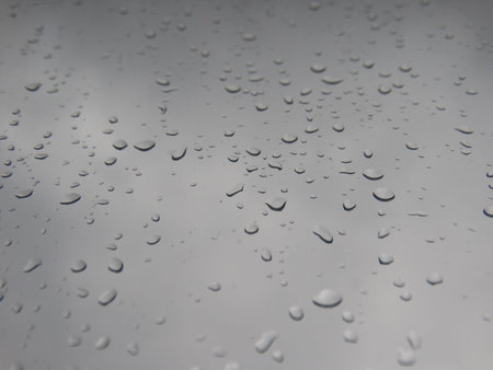 Rain drops on glass minimalism abstract water black white weather depression season autumn...