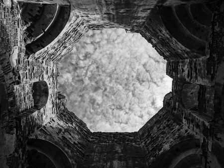 Looking sky old temple church destruction building clouds high religion sightの写真素材