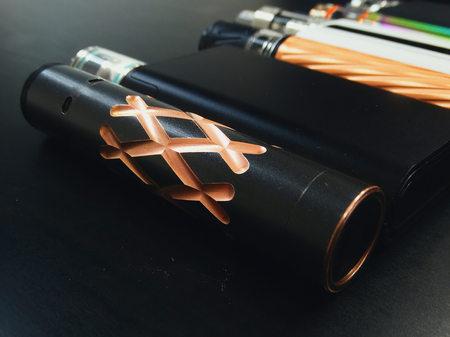 Assortment of electronic cigarettes store device variety vape vaping vapers popular modern style fashion design vaporizer coil trendの写真素材