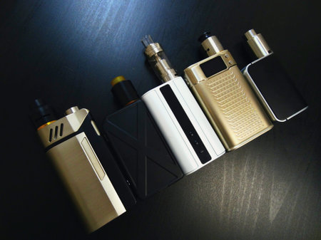 Assortment of electronic cigarettes store device variety vape vaping vapers popular modern style...