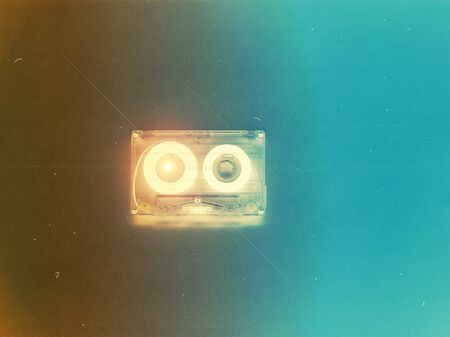 Audio cassettes for recorder 80s 90s 70s retro vintage old music time generation music tape wallpaper background style nostalgia song neon coverの写真素材