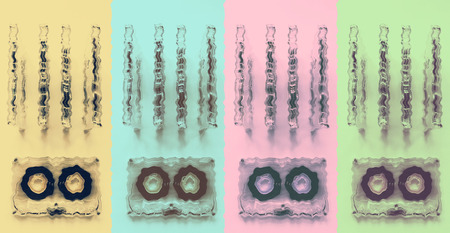 Audio cassettes for recorder 80s 90s 70s retro vintage old music time generation music tape wallpaper background style nostalgia song cover effect water wavesの写真素材