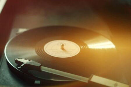 The old gramophone on the table vintage retro rarity style 40s 50s 60s closeup vinyl needle song music time melody generationの写真素材