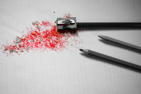 Red shavings after sharpening the pencil