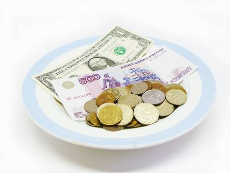 Money on saucerの写真素材