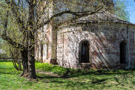Aging church on background blue sky in Russiaの写真素材