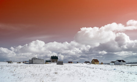 Selilskiy landscape on background blue sky at winter time of the yearの写真素材