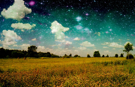 Beautiful year landscape in rural terrain on background starry skyの写真素材