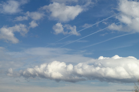 Natural background with white cloud on turn blue at bright solar dayの写真素材