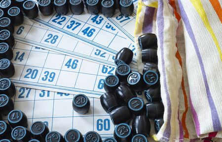 Bag with cask and card for game of lotto.Blue number in circle on black caskの写真素材
