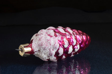 The Old toys for fir tree on black background. Festive embellishment on Cristmasの写真素材