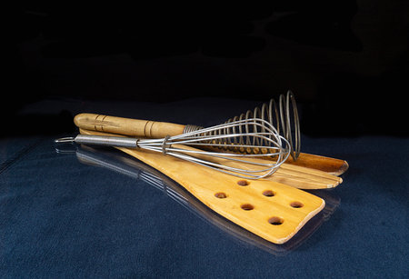 The Kitchen instruments are from tree to rest upon glass table with reflection. Subjects for kitchen...