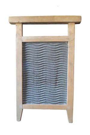 An old washing board isolated on a white background. Hand tool for washing clothesの写真素材
