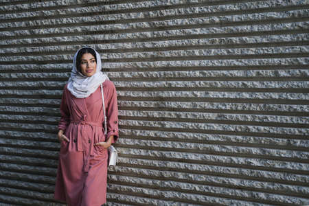 Arab young woman wearing hijab on the streetの写真素材