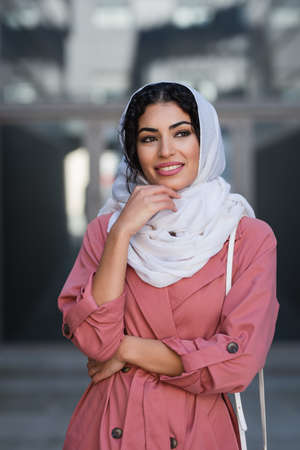 Arab young woman wearing hijab on the streetの写真素材