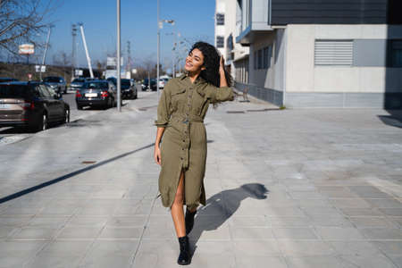 Beauty young mixed race woman walking happy on the streetの写真素材