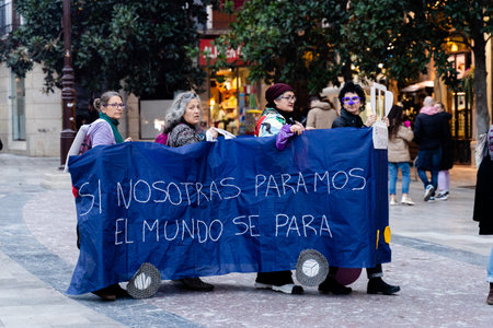 people demonstrating in the streets of Granada, on international womens dayのeditorial素材