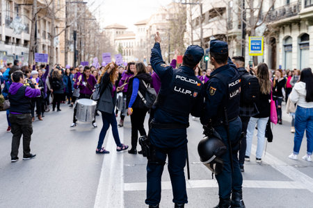 people demonstrating in the streets of Granada, on international womens dayのeditorial素材
