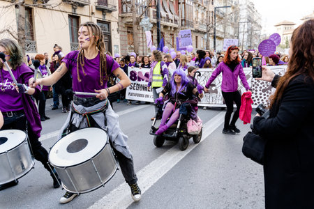 people demonstrating in the streets of Granada, on international womens dayのeditorial素材