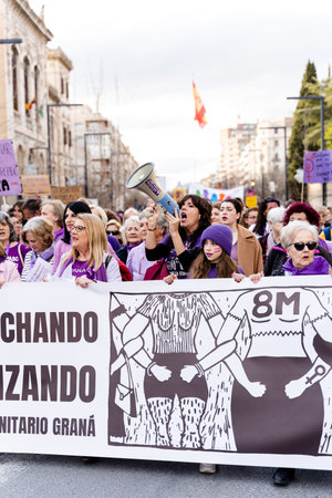 people demonstrating in the streets of Granada, on international womens dayのeditorial素材