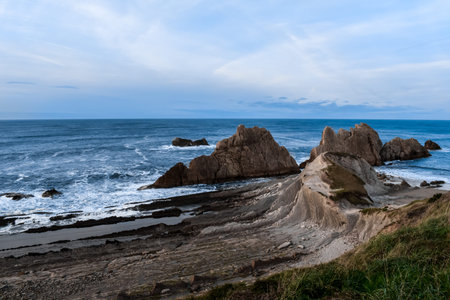 Singular sights at this beautiful landmark, where we can see a rocky beach and steep cliffs.