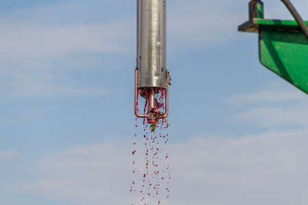 Automatic sampler for trucks extracts grapes from the vintage to analyze their glucose level and acidity to know the alcoholic degreeの写真素材