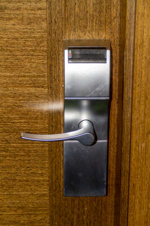 Hotel room door with key card opening systemの写真素材