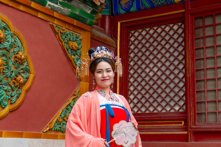 Beijing, China - November 21 2019: A young Chinese model poses inside the Forbidden City in Beijing, November 21 2019, Beijing Chinaのeditorial素材