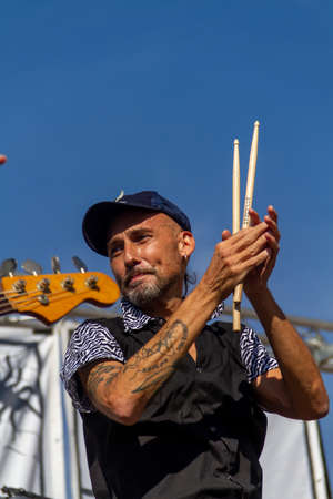 Manises, Valencia, SPAIN - "Dani", drummer of the music rock band in Valencian for children Ramonets, during a concert during the COVID 19 pandemic. October 18, 2020 Manises, Valencia SPAINのeditorial素材