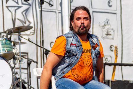 Manises, Valencia, SPAIN - "Urbano", entertainer of the rock group of music in Valencian for children Ramonets, during a concert during the COVID 19 pandemic. October 18, 2020 Manises, Valencia SPAINのeditorial素材