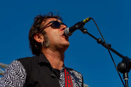 Manises, Valencia, SPAIN - "Ferran", lead singer and guitarist of the music rock group in Valencian for children Ramonets, during a concert during the COVID 19 pandemic. October 18, 2020 Manises, Valencia SPAINのeditorial素材