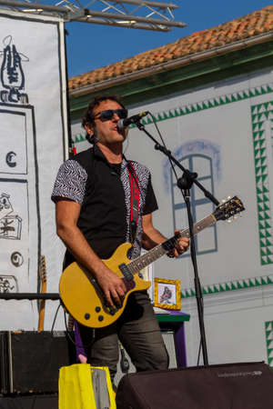 Manises, Valencia, SPAIN - "Ferran", lead singer and guitarist of the music rock group in Valencian for children Ramonets, during a concert during the COVID 19 pandemic. October 18, 2020 Manises, Valencia SPAINのeditorial素材