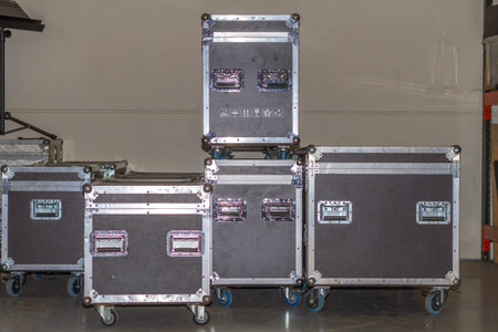 Flight cases placed in the rehearsal room of a rock group