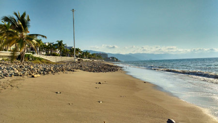 Lonely beach on a sunny dayの写真素材