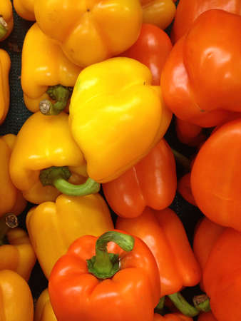Yellow and red peppers togetherの素材