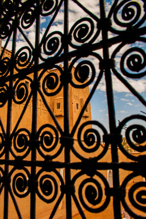Moroccan tipical kasbah beyond window grateの写真素材