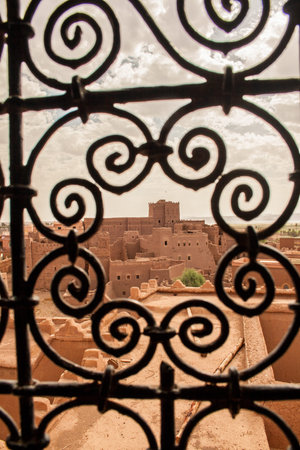 Moroccan tipical kasbah beyond window grateの写真素材