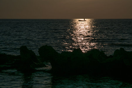 Boat on ionian sea in Italyの写真素材