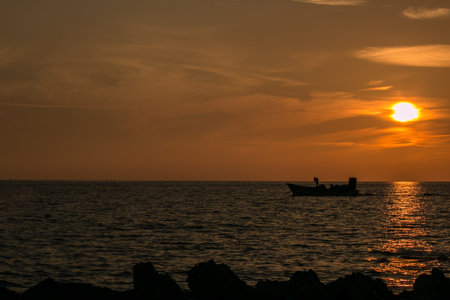 Boat on ionian sea in Italyの写真素材