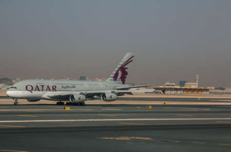 Qatar Airways plane at Doha airportのeditorial素材
