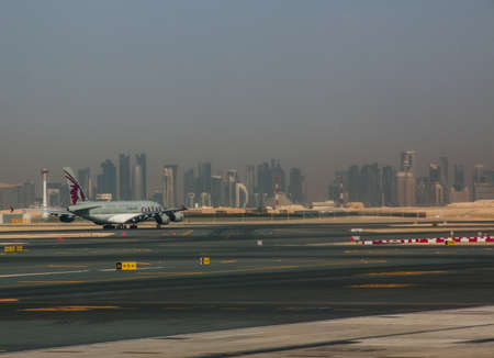 Qatar Airways plane at Doha airportのeditorial素材