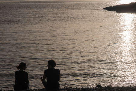 Couple on beach in Salento, Italyの写真素材