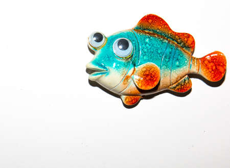 Toy fish on white backgroundの写真素材