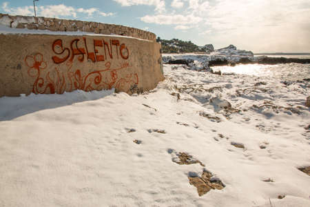 Ionian coast after a exceptional snowfall. 
Jan 2017, Salento, Italy.の写真素材