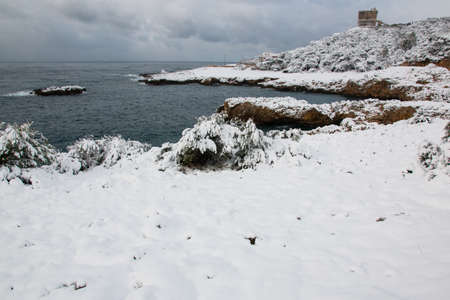 Ionian coast after a exceptional snowfall. 
Jan 2017, Salento, Italy.の写真素材