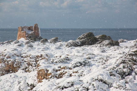 Uluzzo tower after a exceptional snowfall. 
Jan 2017, Salento, Italy.の写真素材