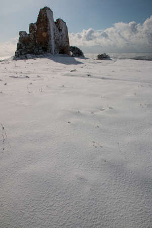 Uluzzo tower after a exceptional snowfall. 
Jan 2017, Salento, Italy.の写真素材