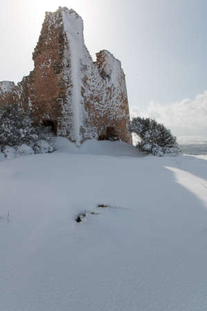 Uluzzo tower after a exceptional snowfall. 
Jan 2017, Salento, Italy.の写真素材