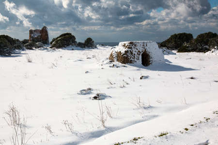 Uluzzo tower after a exceptional snowfall. 
Jan 2017, Salento, Italy.の写真素材