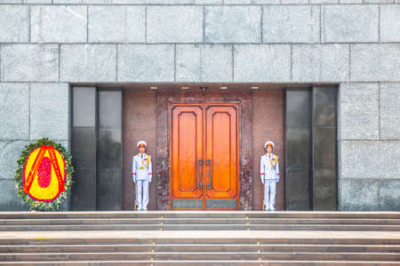 Honor guard at main entrance to the Ho Chi Minh Mausoleum on the Ba Dinh Square in Hanoi, Vietnamのeditorial素材